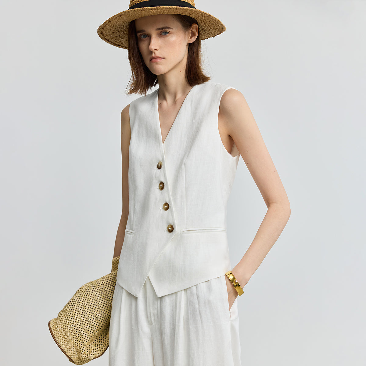An irregular V-neck casual white vest with a breathable linen design