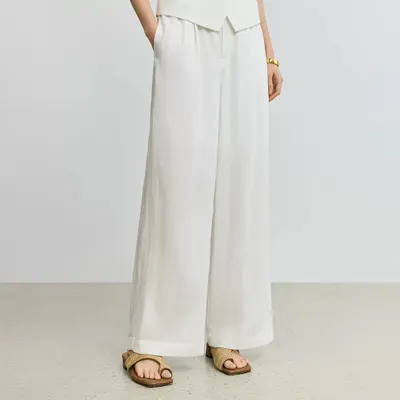 An irregular V-neck casual white vest with a breathable linen design